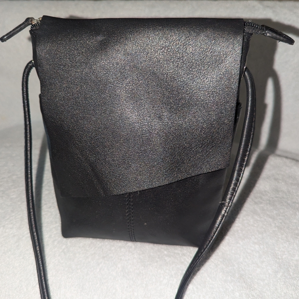 iIi New York leather flap messenger bag.